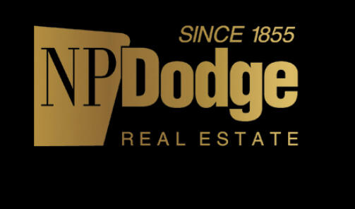 NP Dodge Real Estate Logo